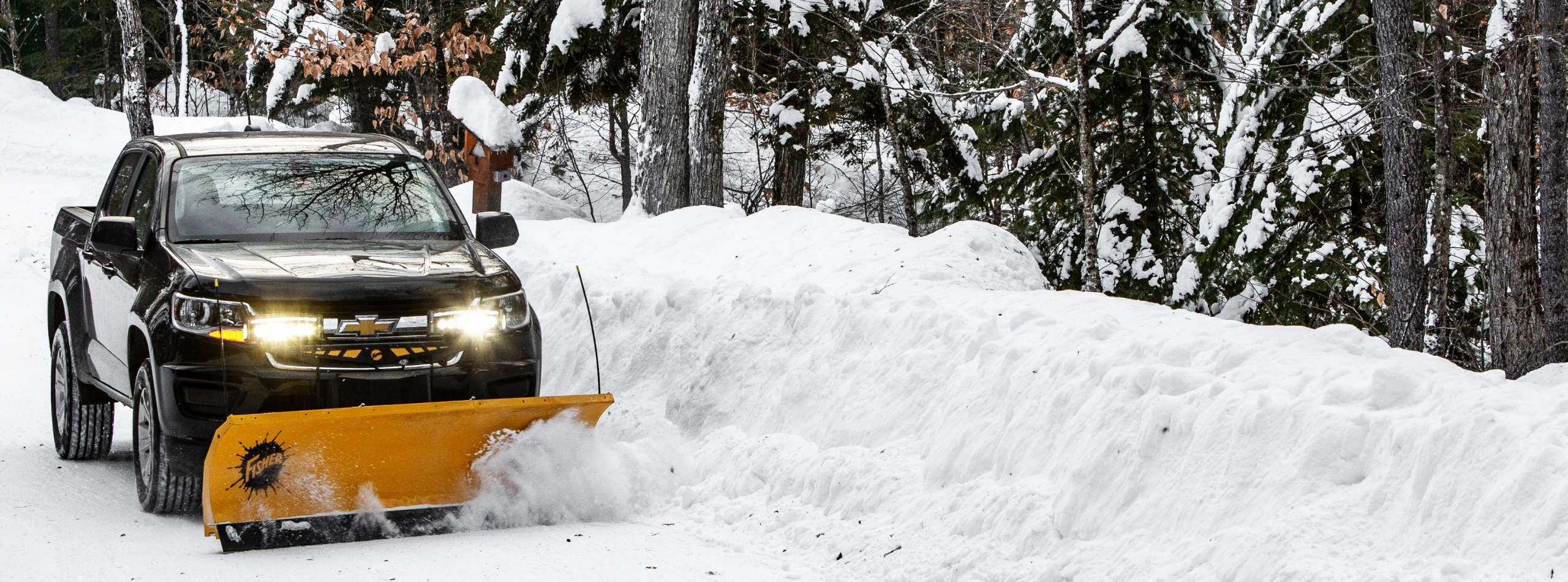 FISHER HS straightblade snowplow on snowy road