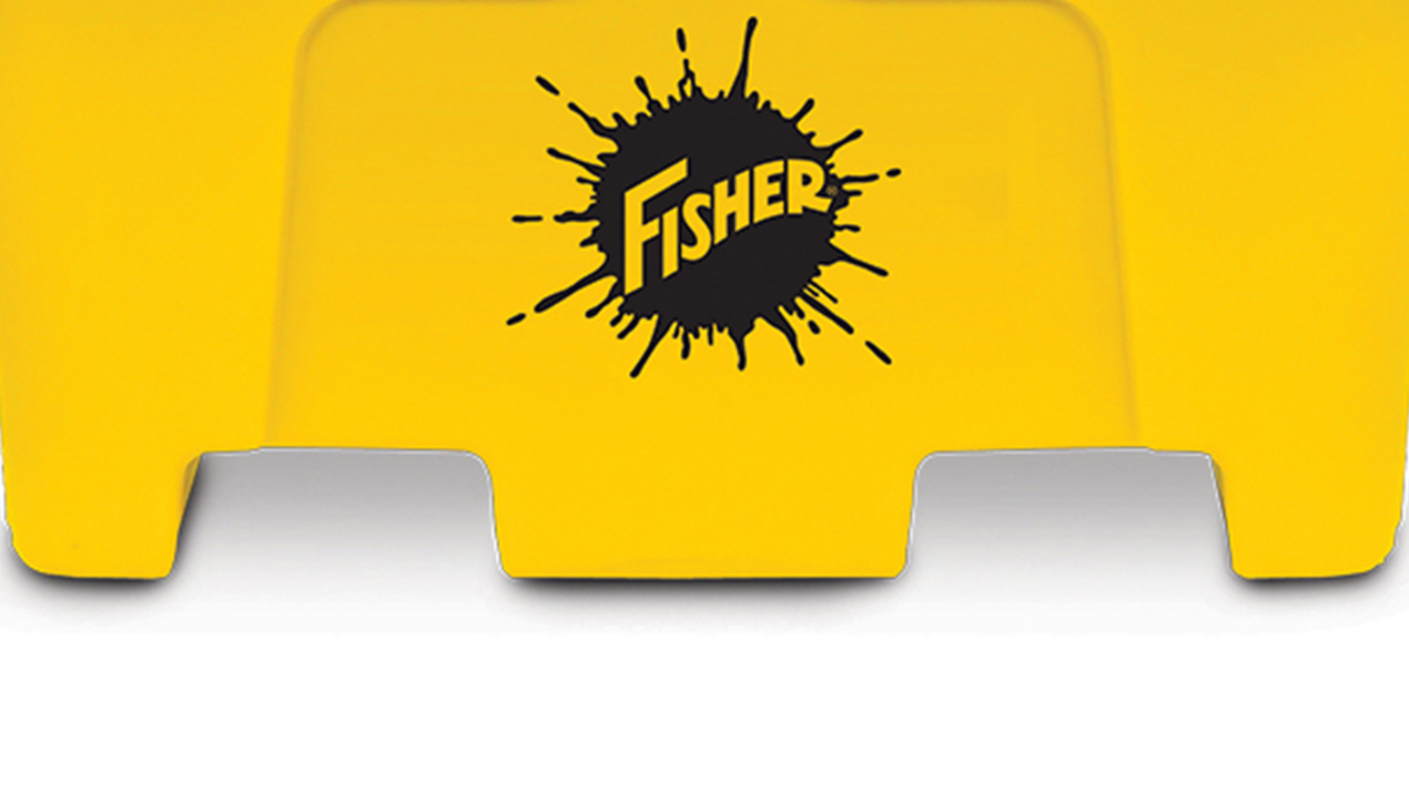 Close-up of a yellow object with a black paint splatter graphic and the word Fisher in bold letters at the center. The bottom edge of the object has a shaped cutout.