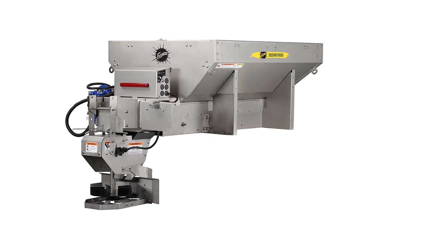 A large industrial stainless steel feeder with a rectangular hopper, control buttons, and mechanical components, designed for precise material dispensing, isolated on a white background.