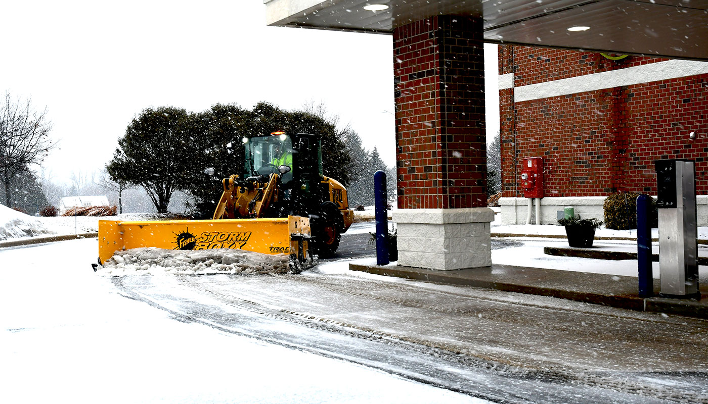 storm boxx trace pusher on loader plowing snow