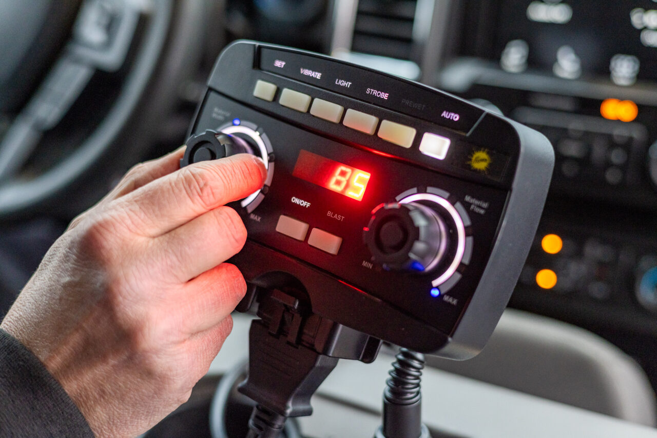 fisher hopper spreader auto speed adjustment