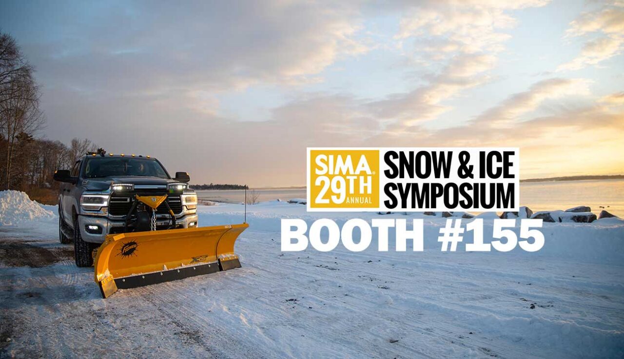 A pickup truck with a yellow snowplow blade is parked on a snowy road by a lake at sunset. Overlaid text reads: SIMA 29th Annual Snow & Ice Symposium Booth #155.