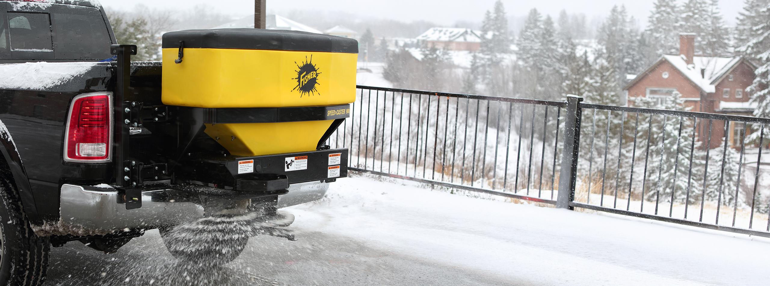 FISHER Speed Caster on back of truck laying salt