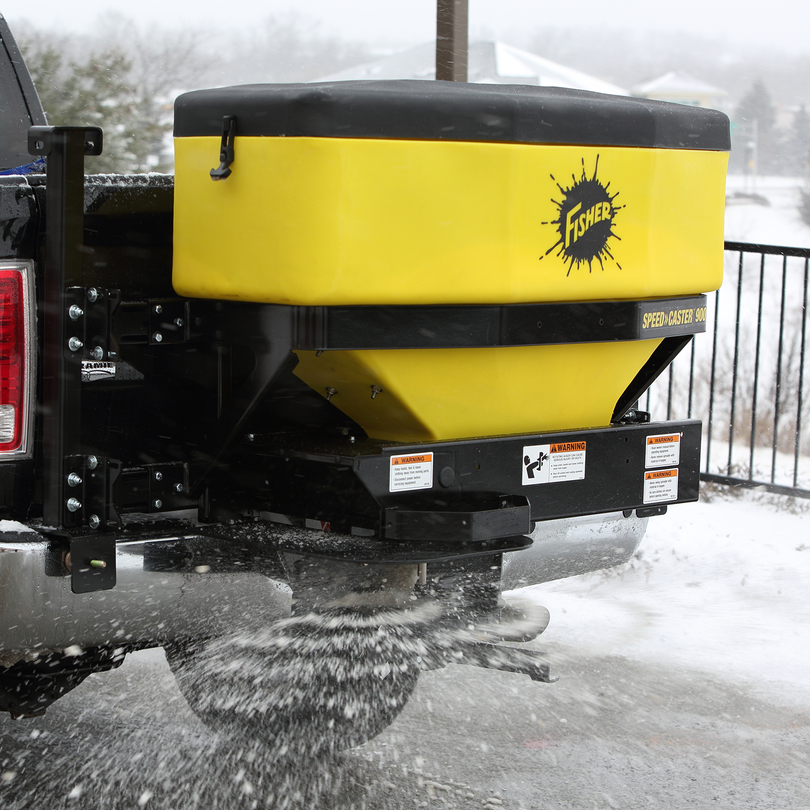 FISHER Speed Caster on back of truck laying salt